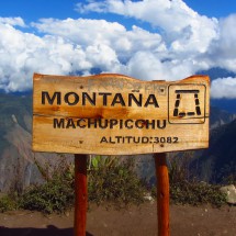 Welcome sign on top of Cerro Machu Picchu